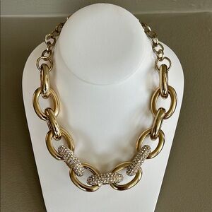 Elegant Gold and Silver Pendant Necklace with Intricate Detailing